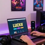 Engaging LUCK8 online betting experience with colorful ambient lighting and gaming accessories.